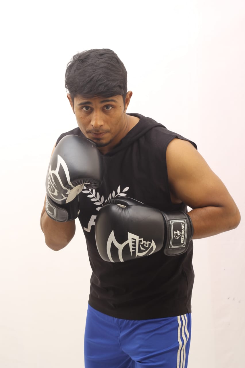 Studio portrait: Al-Amin with his guard up